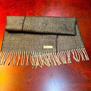 100% cashmere scarf, made in England. 70” x 14”